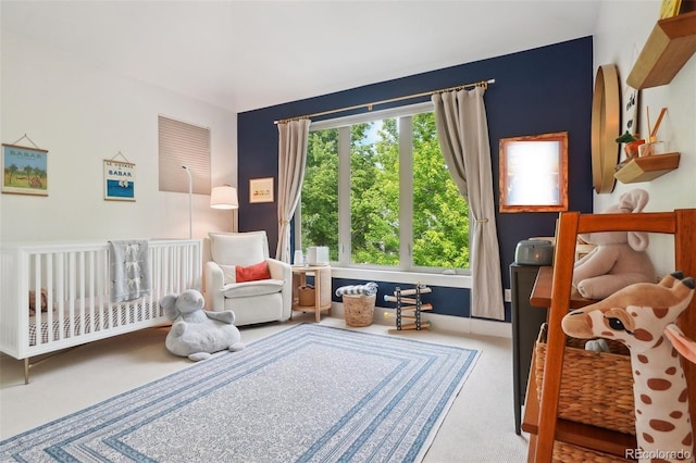 1511 S Pennsylvania St, Denver, CO 80210 - carpeted bedroom featuring a crib