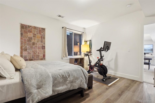 1511 S Pennsylvania St, Denver, CO 80210 - bedroom with wood finished floors and baseboards