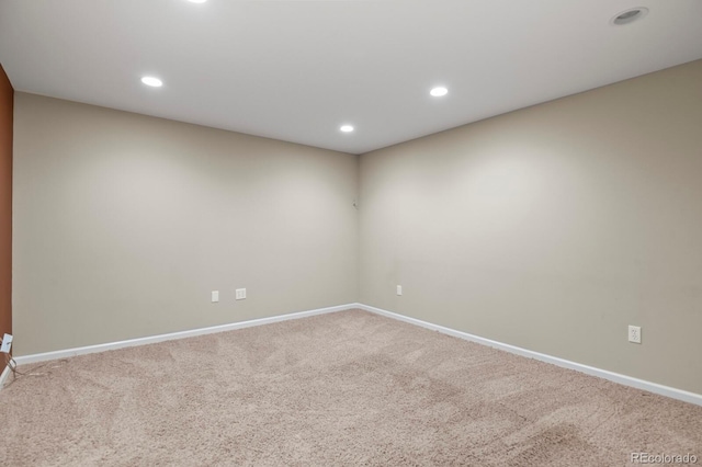 empty room featuring carpet floors