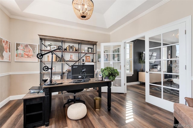 office featuring french doors, a raised ceiling, dark wood-type flooring, and a notable chandelier