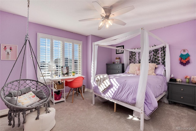 bedroom featuring ceiling fan and light colored carpet