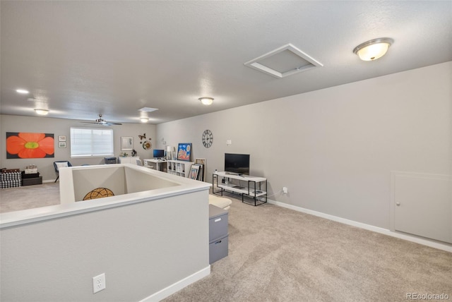 interior space with ceiling fan