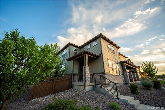 359 Courtfield Way, Castle Pines, CO 80108 - view of side of home featuring brick siding