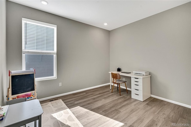 21436 E Stanford Ave, Aurora, CO 80015 - office featuring baseboards, recessed lighting, and wood finished floors