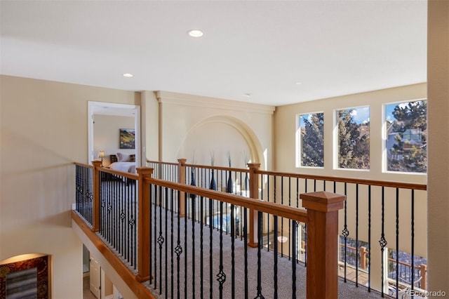 hallway with carpet flooring