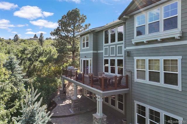 rear view of house with a patio