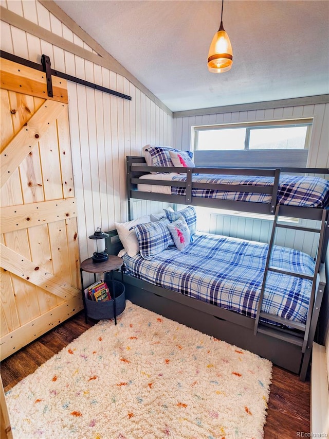 bedroom featuring wood finished floors