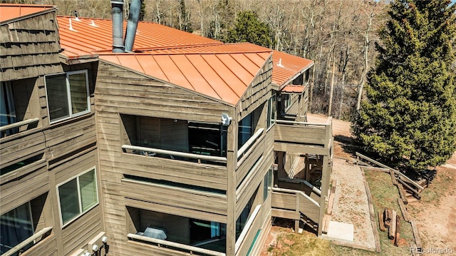 view of home's exterior featuring metal roof and a standing seam roof
