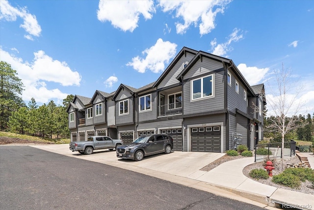 31191 Black Eagle Dr Unit 304, Evergreen, CO 80439 - multi unit property featuring an attached garage, driveway, and a residential view