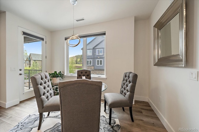 31191 Black Eagle Dr Unit 304, Evergreen, CO 80439 - dining space with light wood finished floors and baseboards