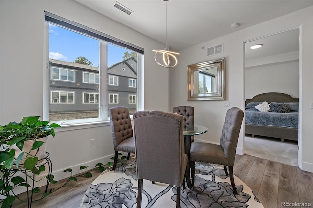31191 Black Eagle Dr Unit 304, Evergreen, CO 80439 - dining room featuring wood finished floors and baseboards