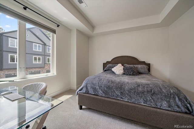 31191 Black Eagle Dr Unit 304, Evergreen, CO 80439 - bedroom with carpet, a raised ceiling, and baseboards