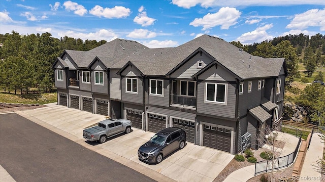 31191 Black Eagle Dr Unit 304, Evergreen, CO 80439 - view of front of home with driveway and a garage