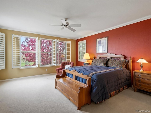 bedroom featuring carpet floors, multiple windows, and ornamental molding