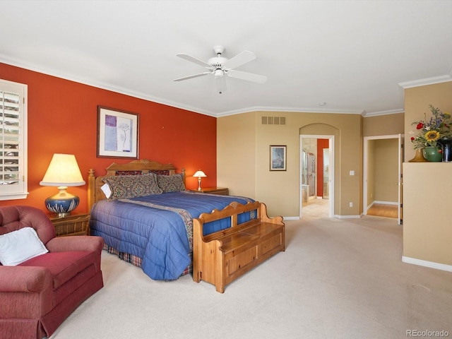 bedroom with crown molding, carpet floors, a ceiling fan, baseboards, and visible vents