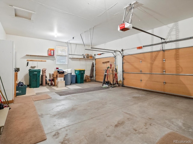 garage featuring a garage door opener