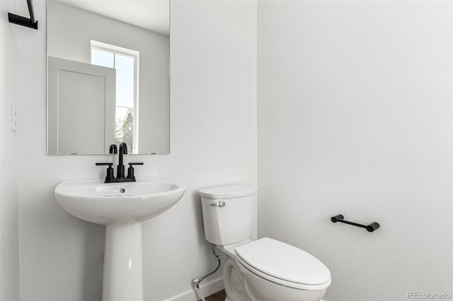 2651 E 102nd Pl, Thornton, CO 80229 - bathroom with toilet and baseboards