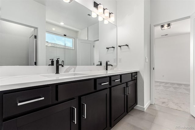 2651 E 102nd Pl, Thornton, CO 80229 - bathroom with double vanity, a shower stall, and tile patterned floors