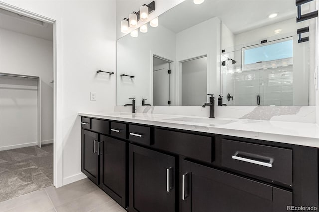 2651 E 102nd Pl, Thornton, CO 80229 - full bath featuring double vanity, a stall shower, and tile patterned floors