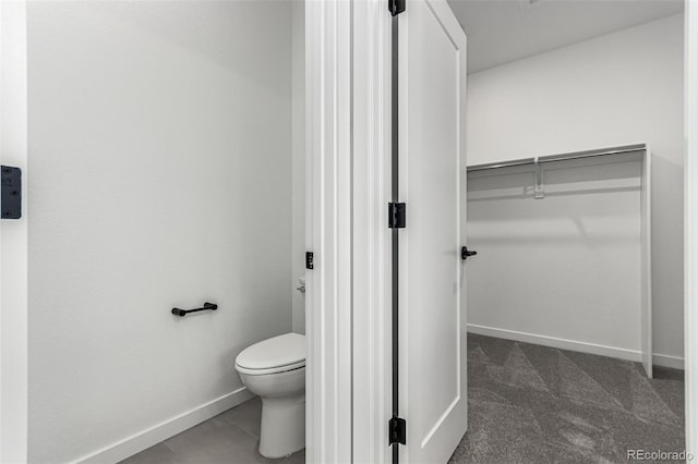 2651 E 102nd Pl, Thornton, CO 80229 - bathroom featuring toilet and baseboards