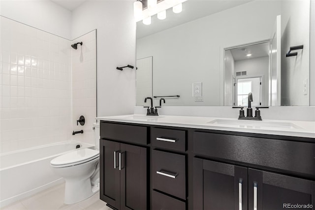 2651 E 102nd Pl, Thornton, CO 80229 - bathroom featuring double vanity, washtub / shower combination, and tile patterned floors