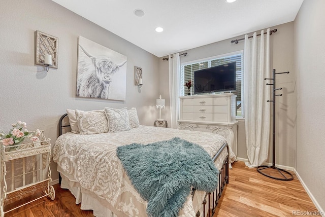 bedroom featuring wood-type flooring