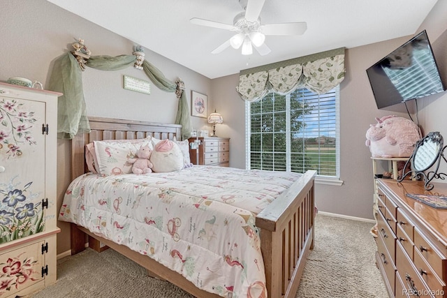 bedroom featuring light carpet and ceiling fan