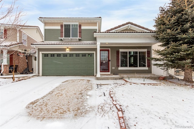 view of front of property featuring a garage