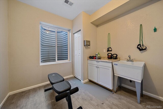 12590 Valentia St, Thornton, CO 80602 - interior space with wood finished floors and baseboards