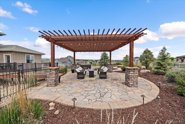 12590 Valentia St, Thornton, CO 80602 - view of patio / terrace with a pergola and an outdoor hangout area