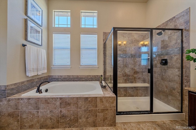 12590 Valentia St, Thornton, CO 80602 - full bath featuring a garden tub and a shower stall