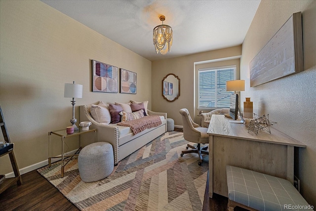 12590 Valentia St, Thornton, CO 80602 - office space with wood finished floors, baseboards, a chandelier, and a textured wall