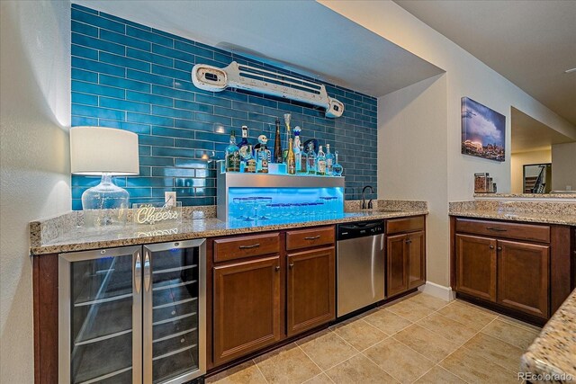 12590 Valentia St, Thornton, CO 80602 - indoor wet bar with stainless steel dishwasher, wine cooler, and light tile patterned floors