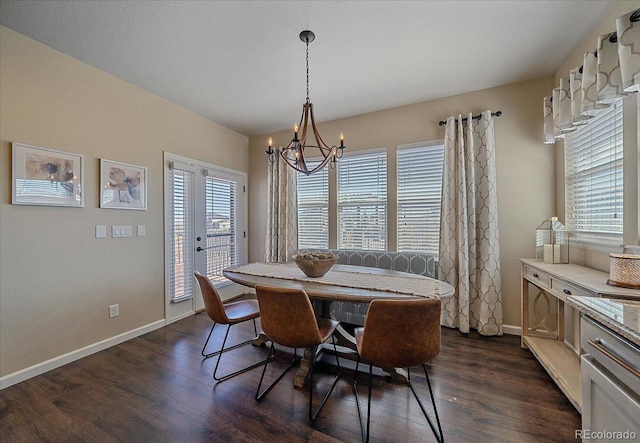 12590 Valentia St, Thornton, CO 80602 - dining room with a chandelier, dark wood-style floors, and baseboards