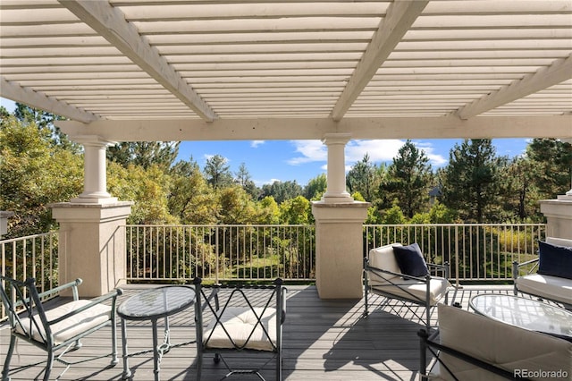 wooden deck with a pergola