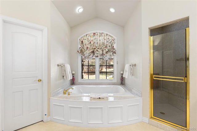 full bath featuring a shower stall, lofted ceiling, recessed lighting, and a bath