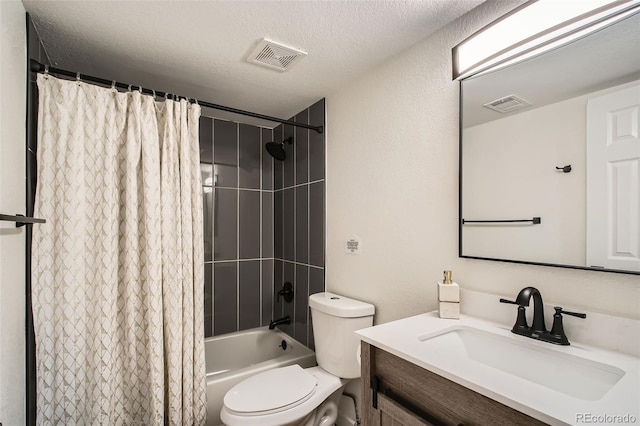 bathroom featuring toilet, vanity, visible vents, and shower / bathtub combination with curtain