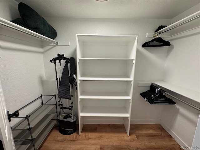 10785 W 63rd Pl Unit 108, Arvada, CO 80004 - spacious closet with wood finished floors