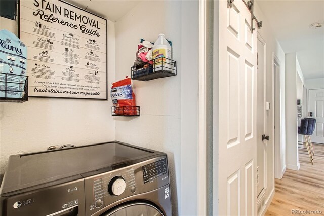 10785 W 63rd Pl Unit 108, Arvada, CO 80004 - washroom with wood finished floors