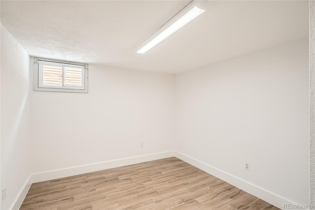 814 S High St, Denver, CO 80209 - unfurnished room with light wood-style flooring and baseboards