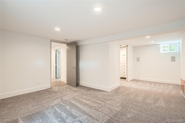 814 S High St, Denver, CO 80209 - spare room featuring light colored carpet, baseboards, and recessed lighting