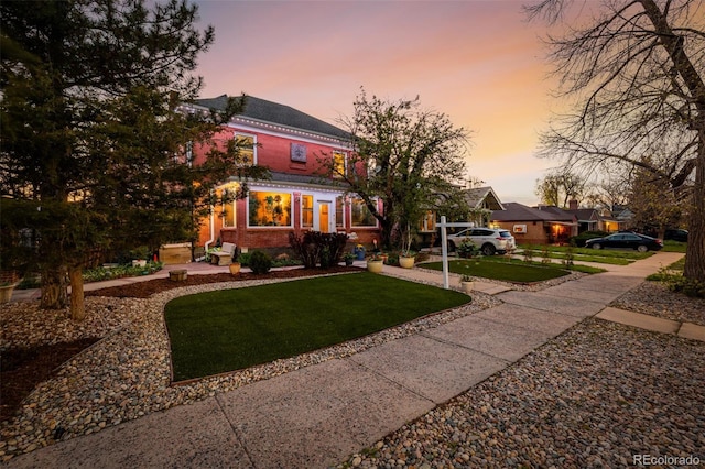 1521 Pontiac St, Denver, CO 80220 - view of front of house featuring a front lawn and brick siding