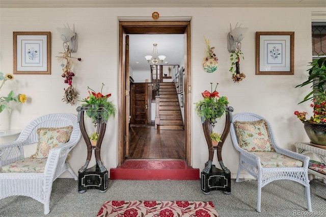 1521 Pontiac St, Denver, CO 80220 - hall with carpet floors, a chandelier, and stairway