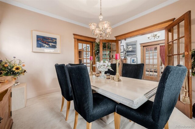 1521 Pontiac St, Denver, CO 80220 - dining room featuring a chandelier, carpet, baseboards, a healthy amount of sunlight, and ornamental molding