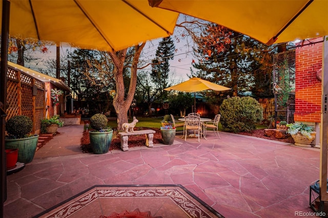1521 Pontiac St, Denver, CO 80220 - view of patio with a fenced backyard and outdoor dining area