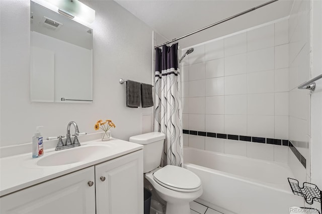 full bathroom featuring a textured ceiling, shower / tub combo, vanity, and toilet