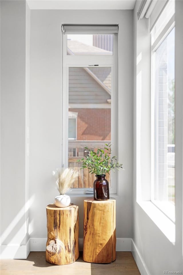 1457 Yates St, Denver, CO 80204 - sitting room with healthy amount of natural light and wood finished floors