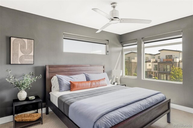 1457 Yates St, Denver, CO 80204 - carpeted bedroom featuring baseboards and a ceiling fan