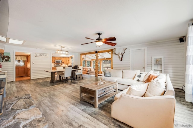 11531 S Deer Creek Rd, Littleton, CO 80127 - living room with ceiling fan and wood finished floors