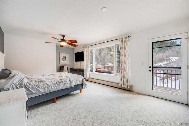 11531 S Deer Creek Rd, Littleton, CO 80127 - carpeted bedroom with a baseboard radiator, access to outside, multiple windows, and ceiling fan